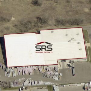 80,000 square foot Madison industrial office warehouse building leased to SRS Building Products after sale versus reinvestment analysis